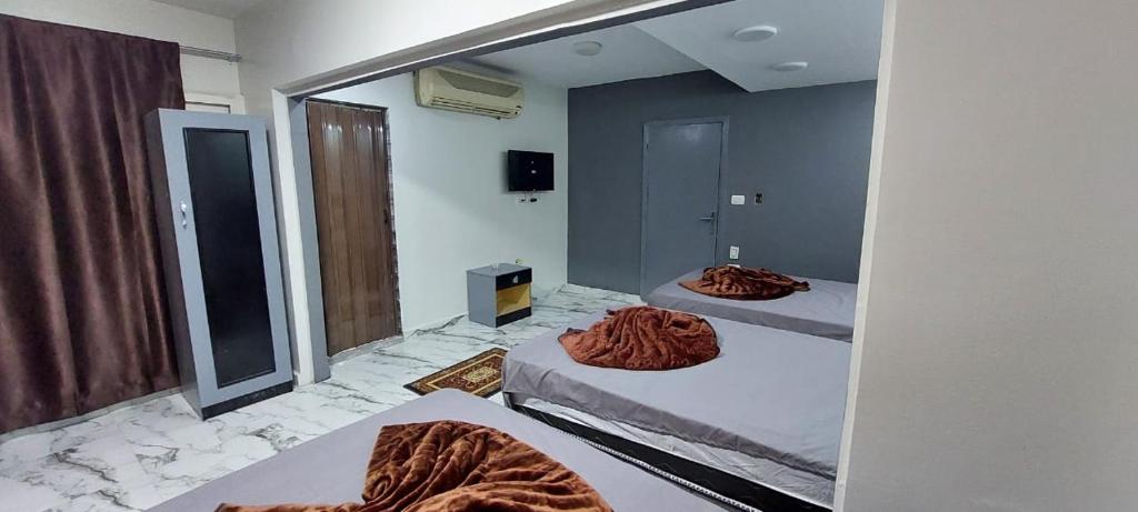 Postel nebo postele na pokoji v ubytování Best Dreams Hotel