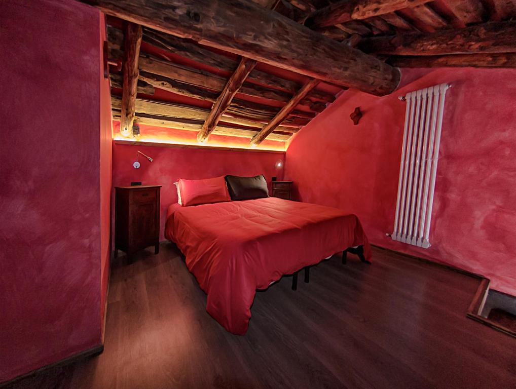 Postel nebo postele na pokoji v ubytování Agriturismo Rivet d'Or