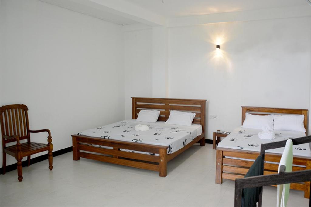 Postel nebo postele na pokoji v ubytování Paramata Accommodation