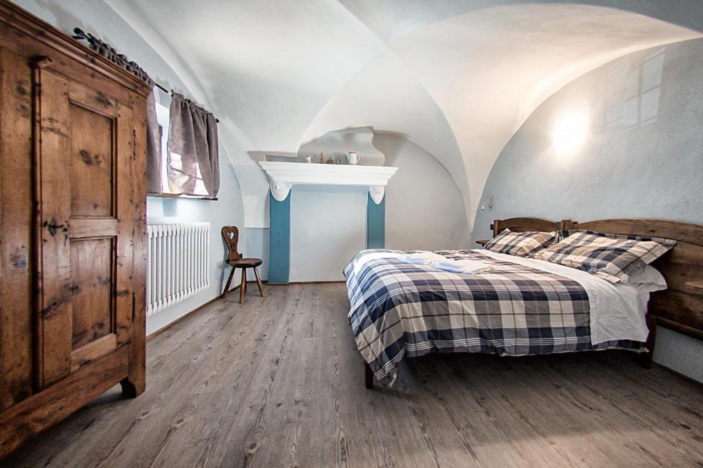 Postel nebo postele na pokoji v ubytování Agriturismo Rivet d'Or