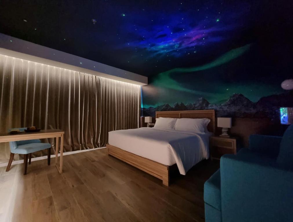 Postel nebo postele na pokoji v ubytování Hemangini Hotel Bandung