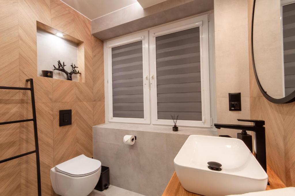 Kúpeľňa v ubytovaní Apartamenty u Zajączków