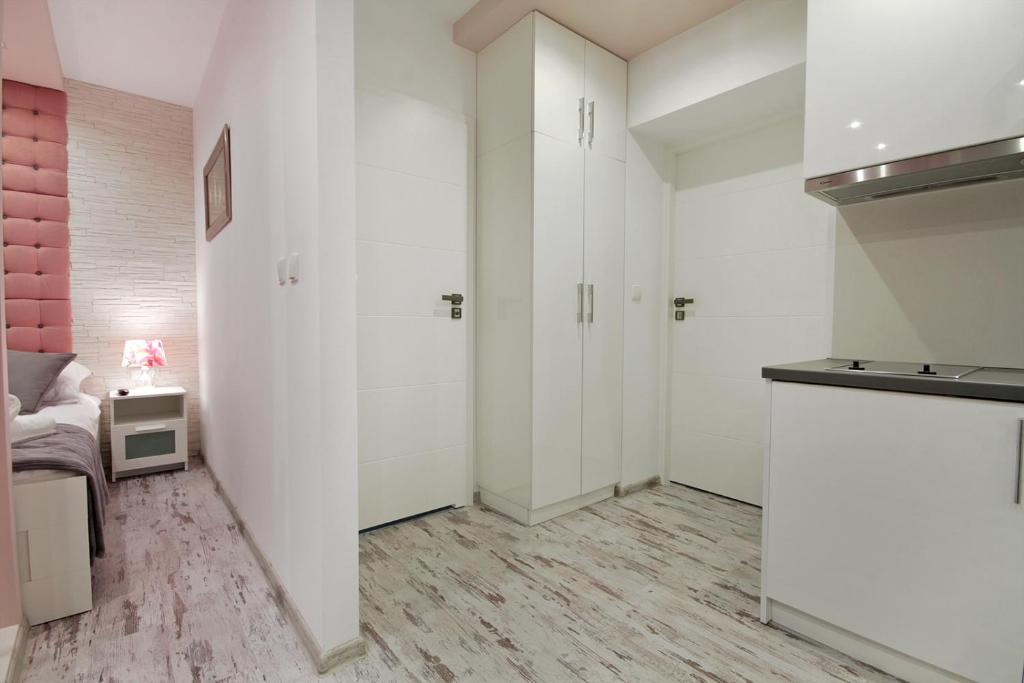 Kuchyňa alebo kuchynka v ubytovaní Apartamenty u Zajączków