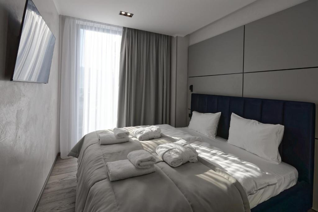 Кровать или кровати в номере Rest&Ski Spa Resort