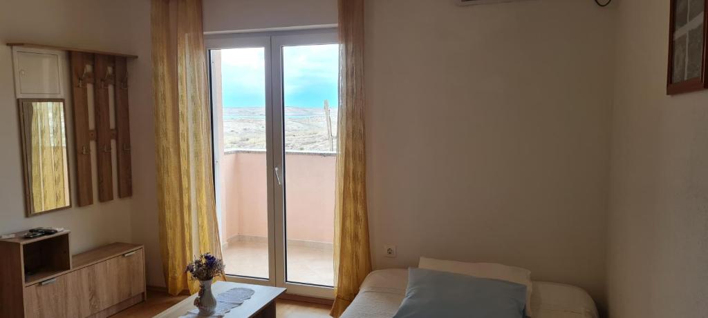 Postel nebo postele na pokoji v ubytování Apartments Zakarija