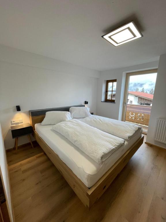 Postel nebo postele na pokoji v ubytování Schneiderhof