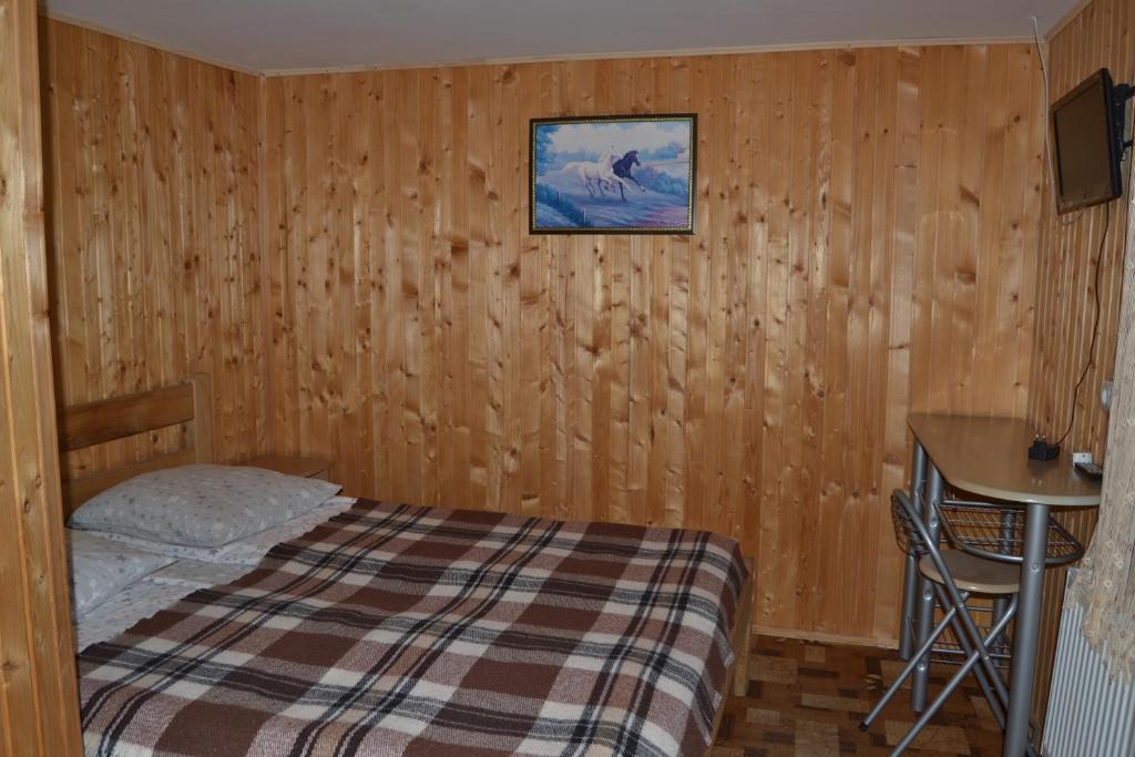 Postel nebo postele na pokoji v ubytování Fortuna