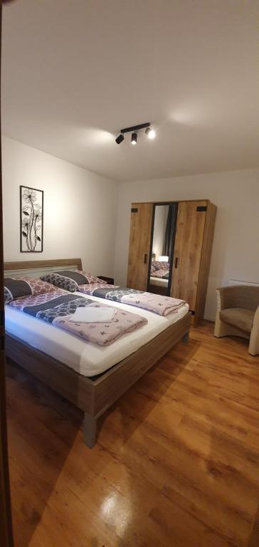 a bedroom with two beds in a room at Haus Schneider in Winterberg