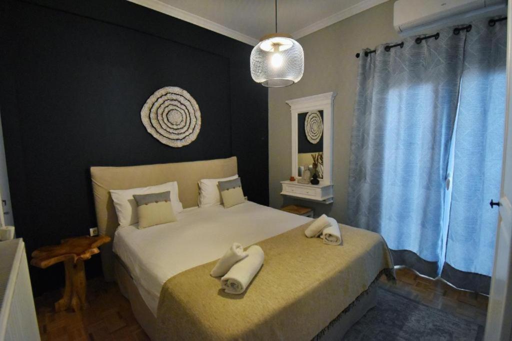 Posteľ alebo postele v izbe v ubytovaní Seven Seconds Away Apartment
