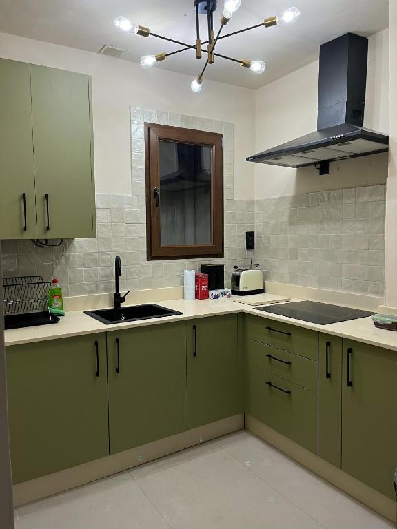 Kuchyňa alebo kuchynka v ubytovaní Apartamento Málaga Centro Tritón
