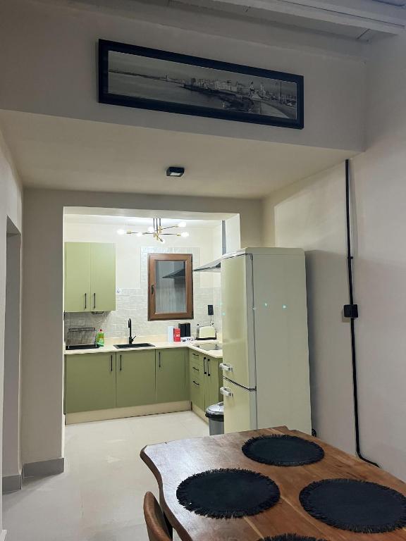 Kuchyňa alebo kuchynka v ubytovaní Apartamento Málaga Centro Tritón