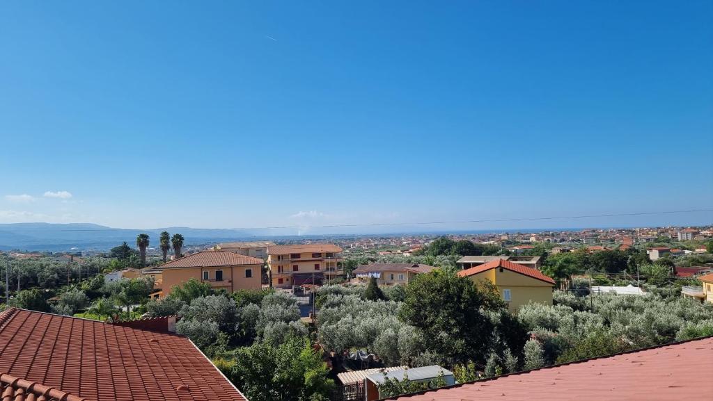 a view of a town with houses and trees at La casa di Isa in Lamezia Terme