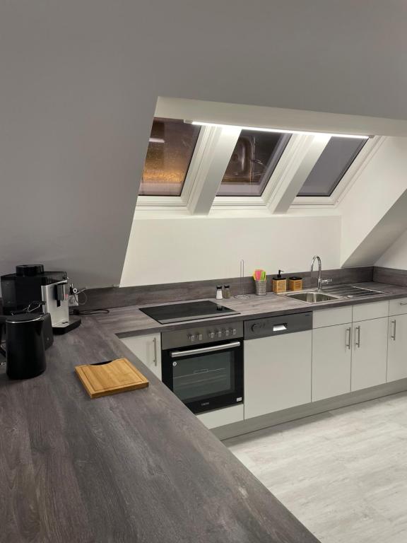 Kuchyň nebo kuchyňský kout v ubytování 24-7 Apartment Passau