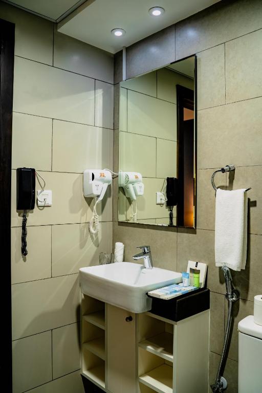 Koupelna v ubytování Luxe Grand Hotel Apartments
