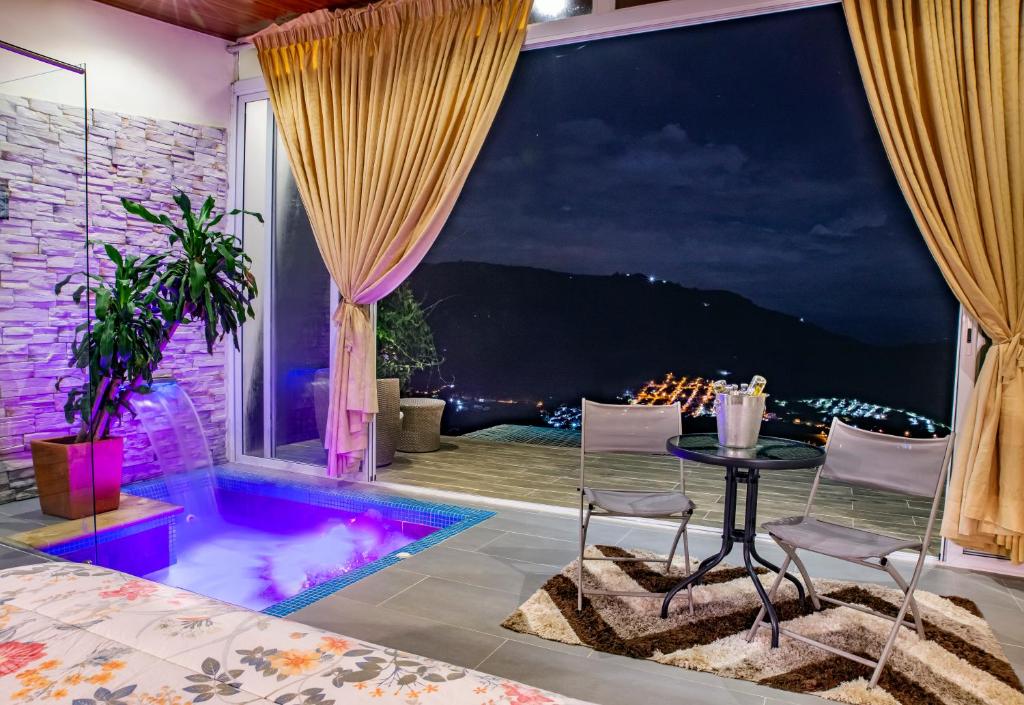 Χώρος καθιστικού στο Sunset Palm Lodge
