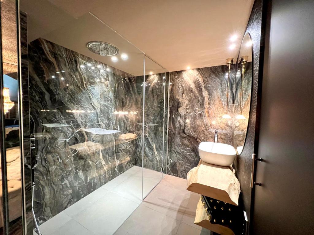 Koupelna v ubytování Hotel & SPA Bringué