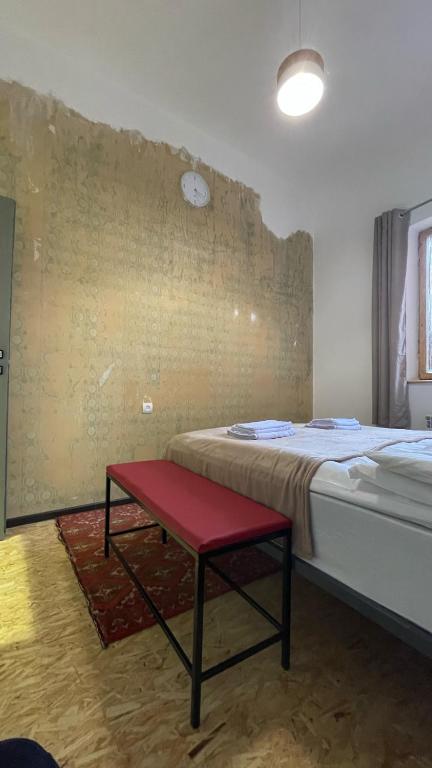 Postel nebo postele na pokoji v ubytování Kotun Gyumri