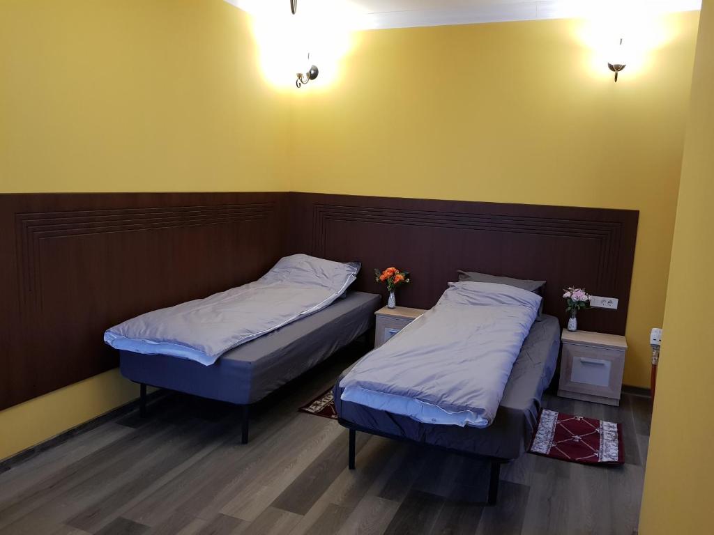 Postel nebo postele na pokoji v ubytování Hotel Restaurant La Passione