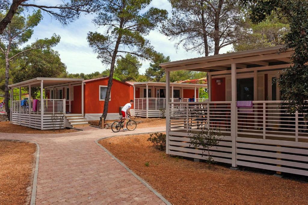 Mobile homes in Camp Soline at Biograd, with sand and pebble beach