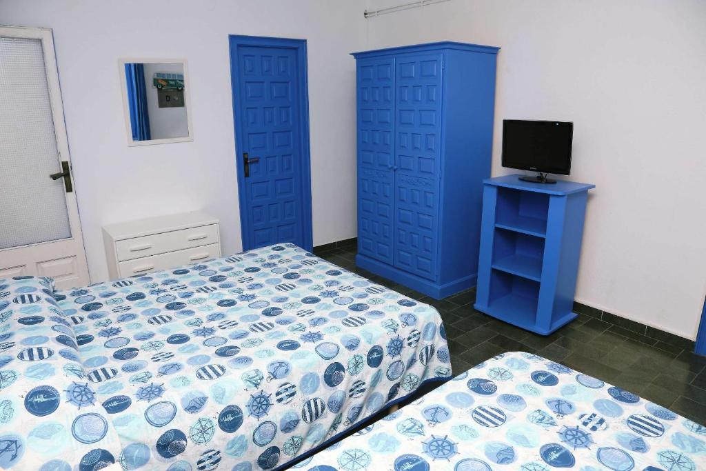 Postel nebo postele na pokoji v ubytování Pensió Solivent