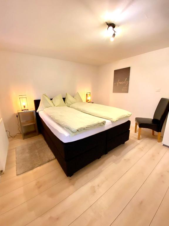 Postel nebo postele na pokoji v ubytování Apartments Soldanella