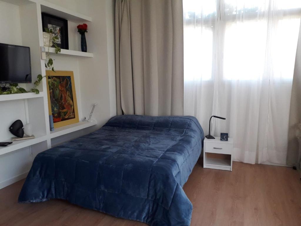 Postel nebo postele na pokoji v ubytování Apartamento turístico Jardines de Asura