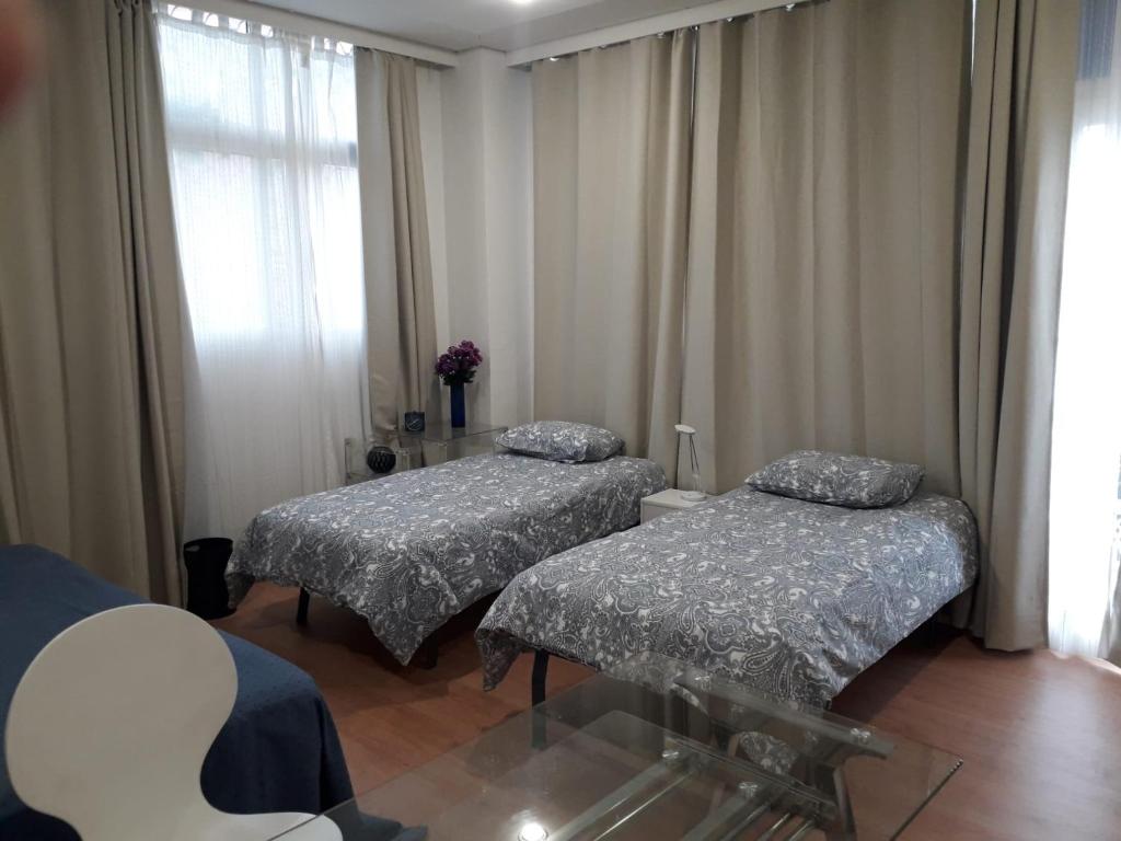 Postel nebo postele na pokoji v ubytování Apartamento turístico Jardines de Asura