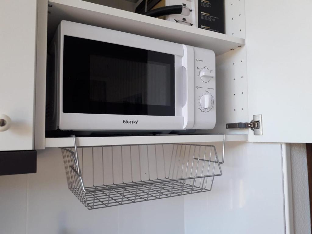 Kuchyň nebo kuchyňský kout v ubytování Apartamento turístico Jardines de Asura
