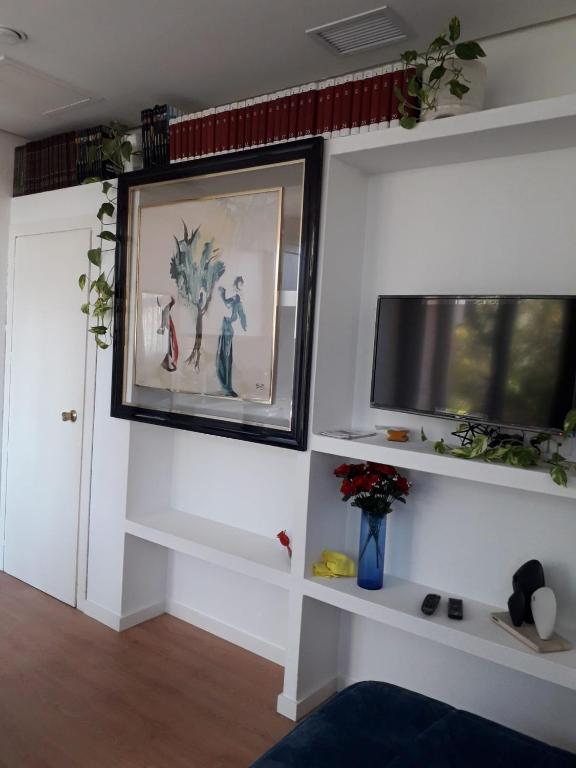 TV a/nebo společenská místnost v ubytování Apartamento turístico Jardines de Asura