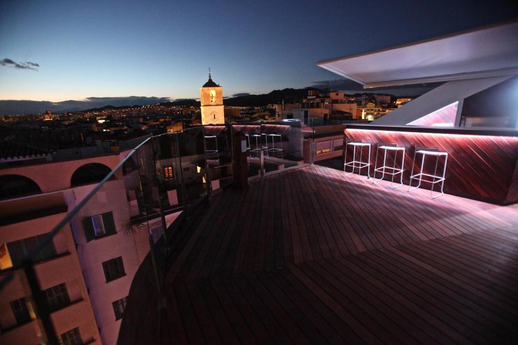 A balcony or terrace at Alcazaba Premium Hotel