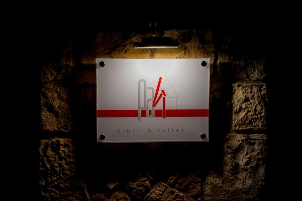 Certifikát, hodnocení, plakát nebo jiný dokument vystavený v ubytování Pavì Trulli e Suites