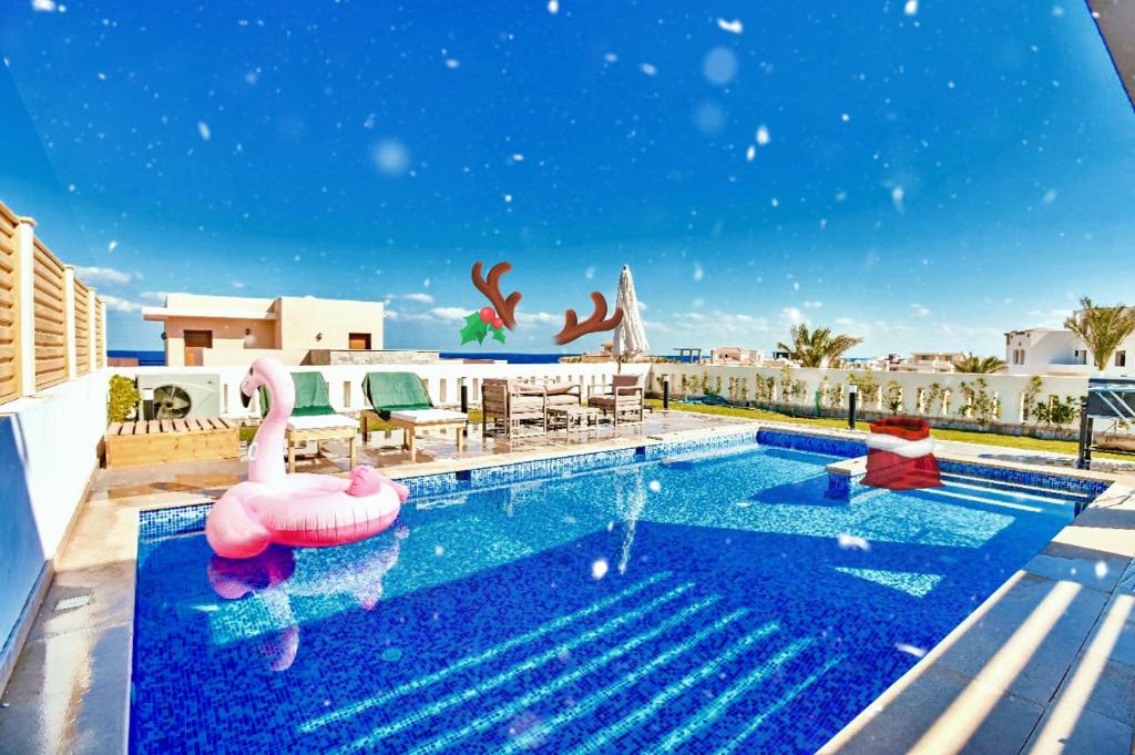 Bazén v ubytování Hurghada Sahl Hasheesh sea-view Villa with private pool nebo v jeho okolí