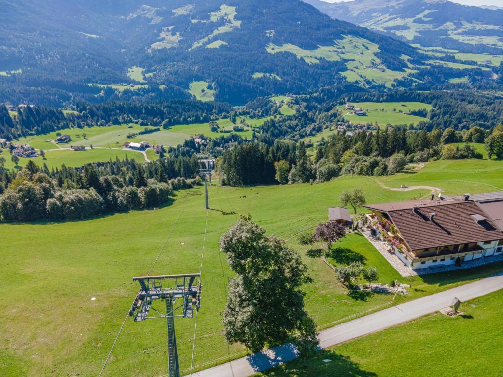 an aerial view of a green field with a house at Igl Hof Top 4 in Westendorf