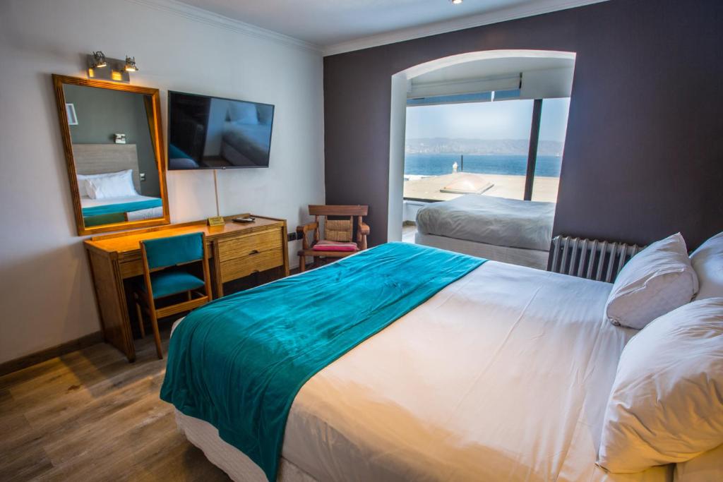 Uma cama ou camas num quarto em Hotel Oceanic