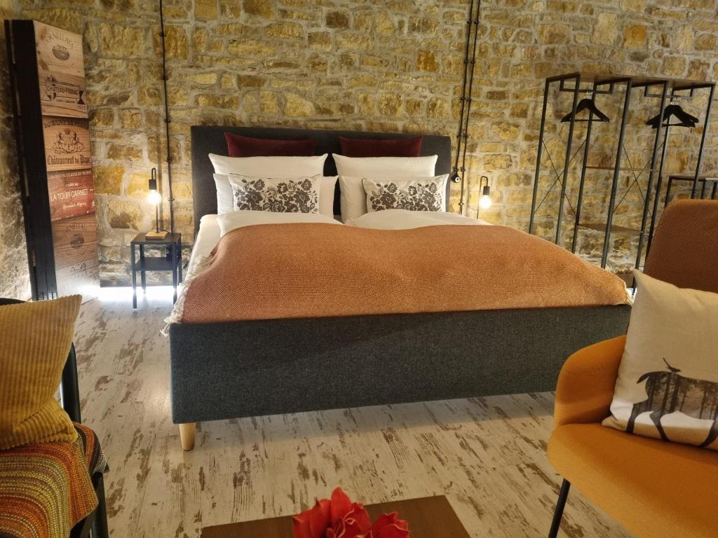 Postel nebo postele na pokoji v ubytování LandPension Stützenmühle