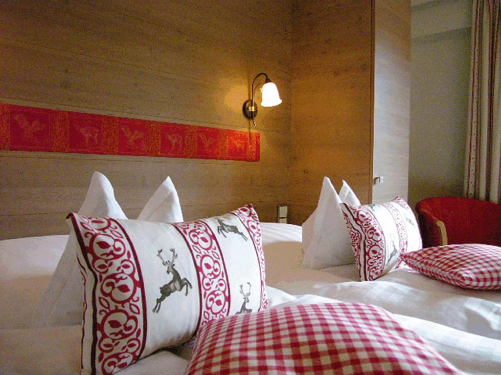 Postel nebo postele na pokoji v ubytování Hotel Gasthof Adler