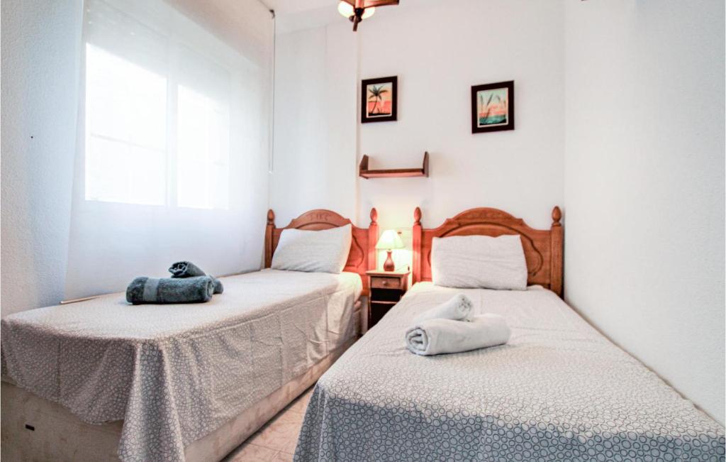 Posteľ alebo postele v izbe v ubytovaní Pet Friendly Apartment In Torrevieja