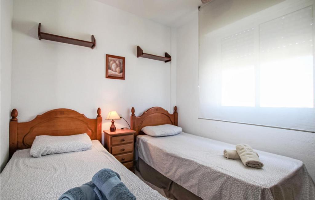 Posteľ alebo postele v izbe v ubytovaní Pet Friendly Apartment In Torrevieja