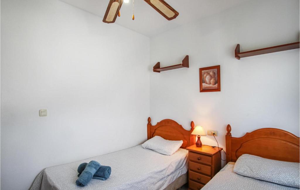 Posteľ alebo postele v izbe v ubytovaní Pet Friendly Apartment In Torrevieja