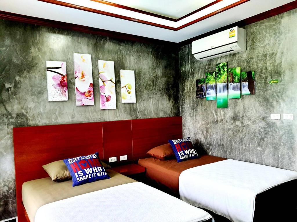 Postel nebo postele na pokoji v ubytování Areeya Phubeach Resort Coliving Coworking