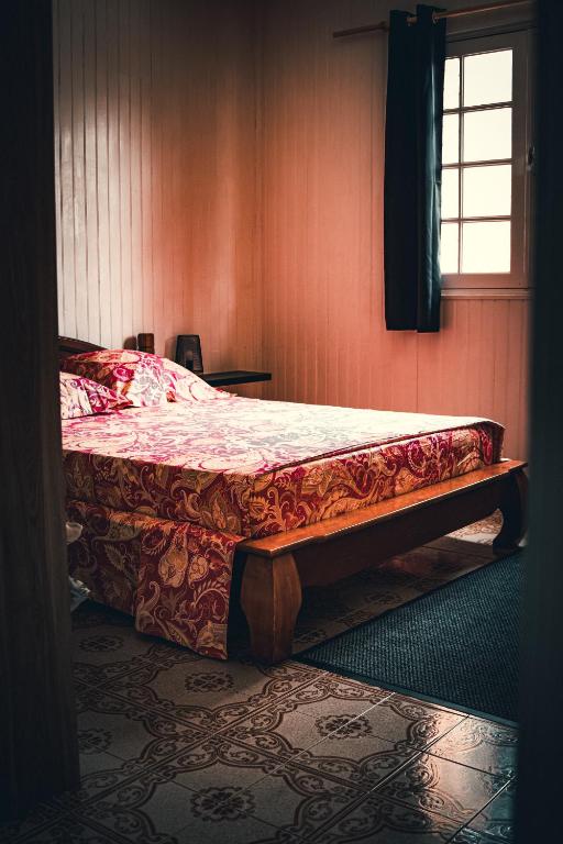 Postel nebo postele na pokoji v ubytování Gite les Bananiers