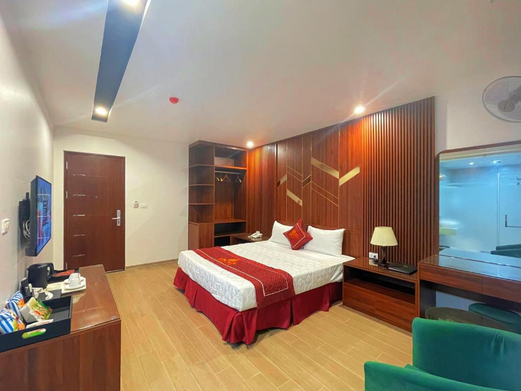 Postel nebo postele na pokoji v ubytování Rosy Hotel