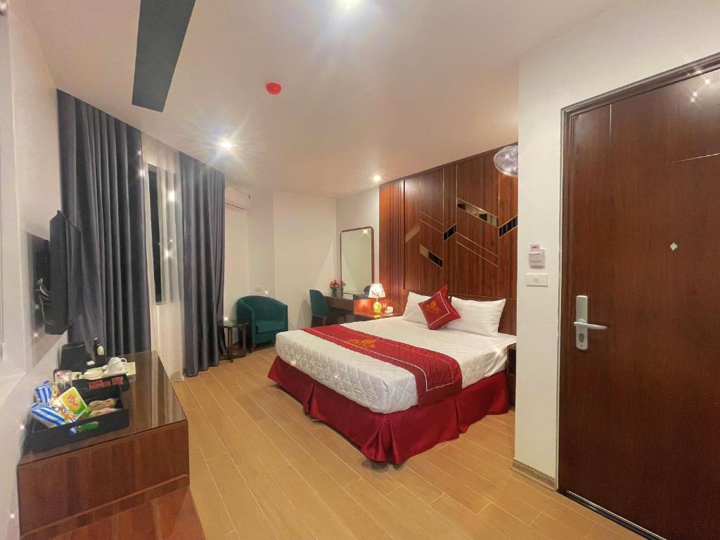 Postel nebo postele na pokoji v ubytování Rosy Hotel
