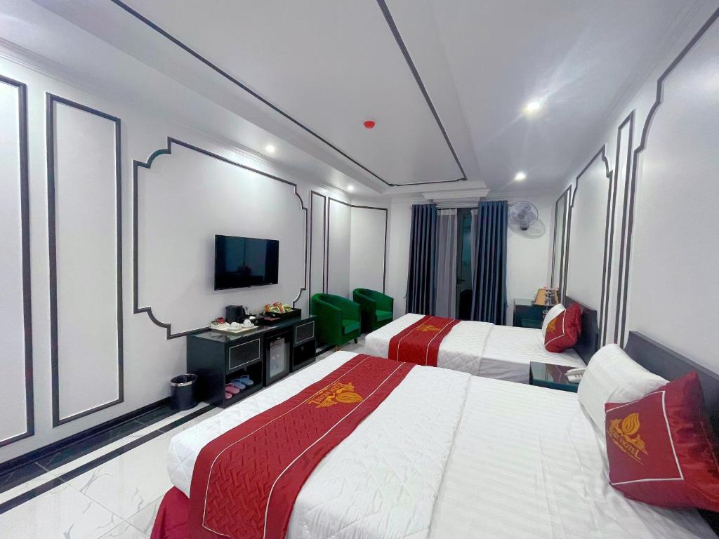 Postel nebo postele na pokoji v ubytování Rosy Hotel