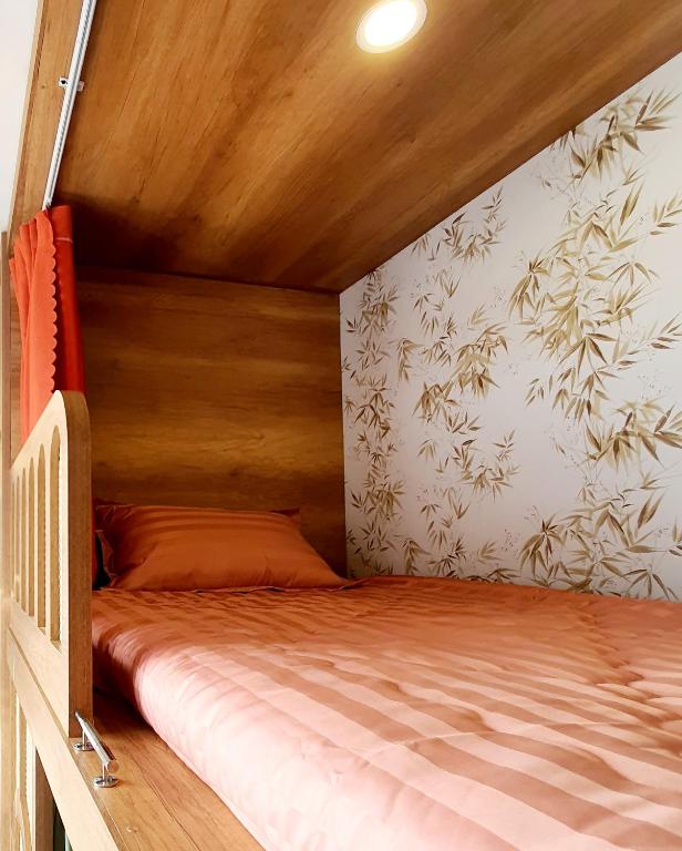 Postel nebo postele na pokoji v ubytování The Lovenote Home