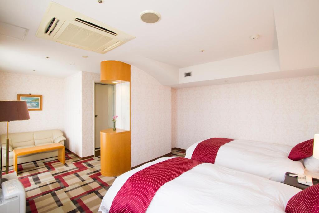 Postel nebo postele na pokoji v ubytování Spa and Resort Hotel Solage Oita Hiji Beppuwan