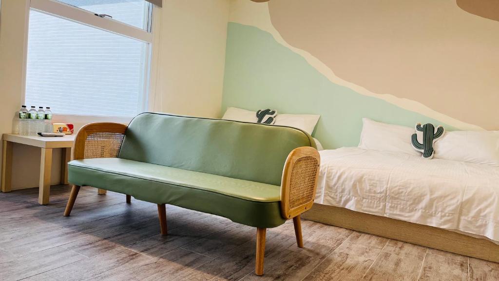 Postel nebo postele na pokoji v ubytování 古栗Chestnut Guest House-可包棟民宿