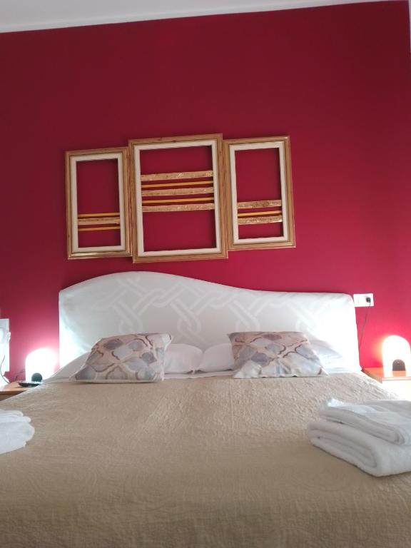Postel nebo postele na pokoji v ubytování Hotel Riposo
