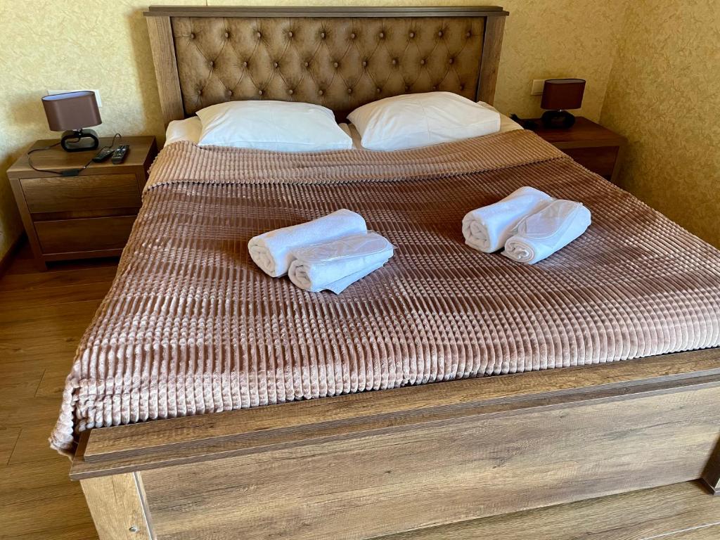 Llit o llits en una habitació de Gudauri Hillsite