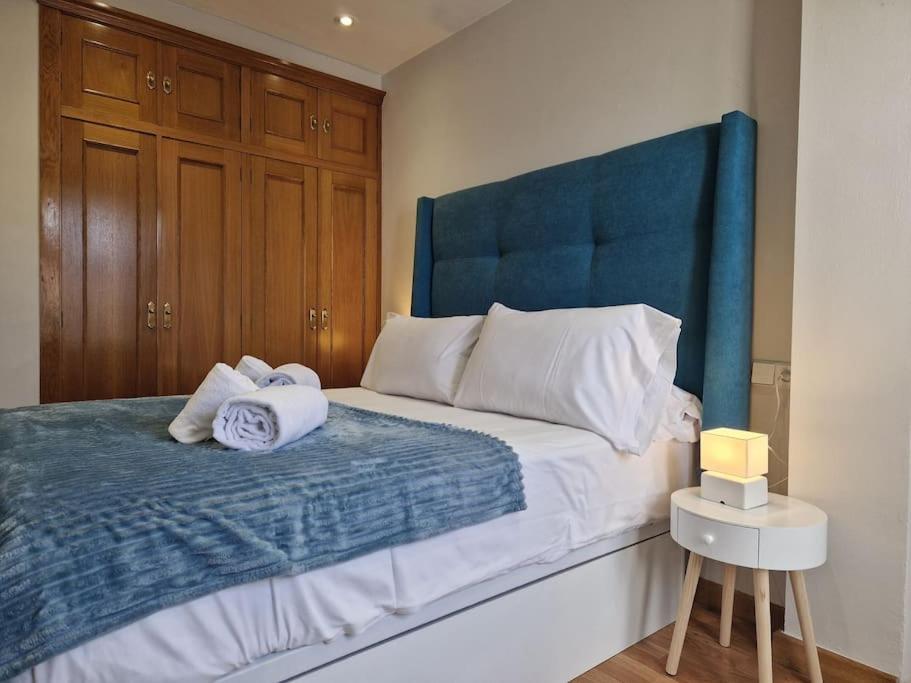 A bed or beds in a room at 614A Coqueto ático
